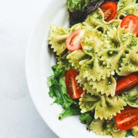 High protein pasta with chicken and vegetables in a white bowl