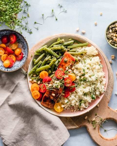 One pot chicken and rice dinner cooking in a Dutch oven